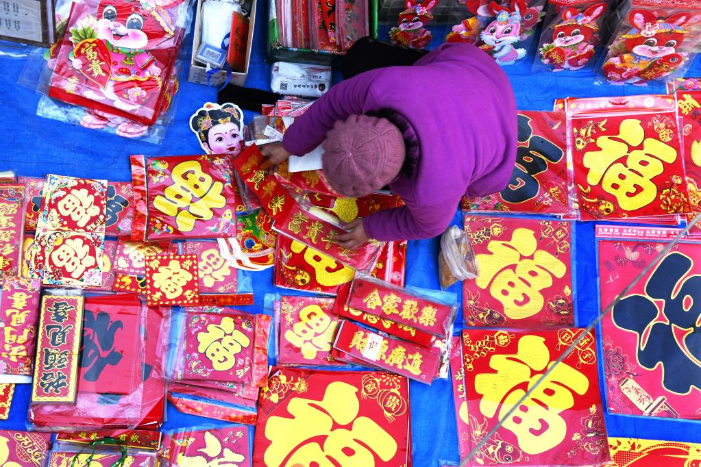 新華全媒+丨煙火氣歸來(lái)！青島百年大集紅火迎新春